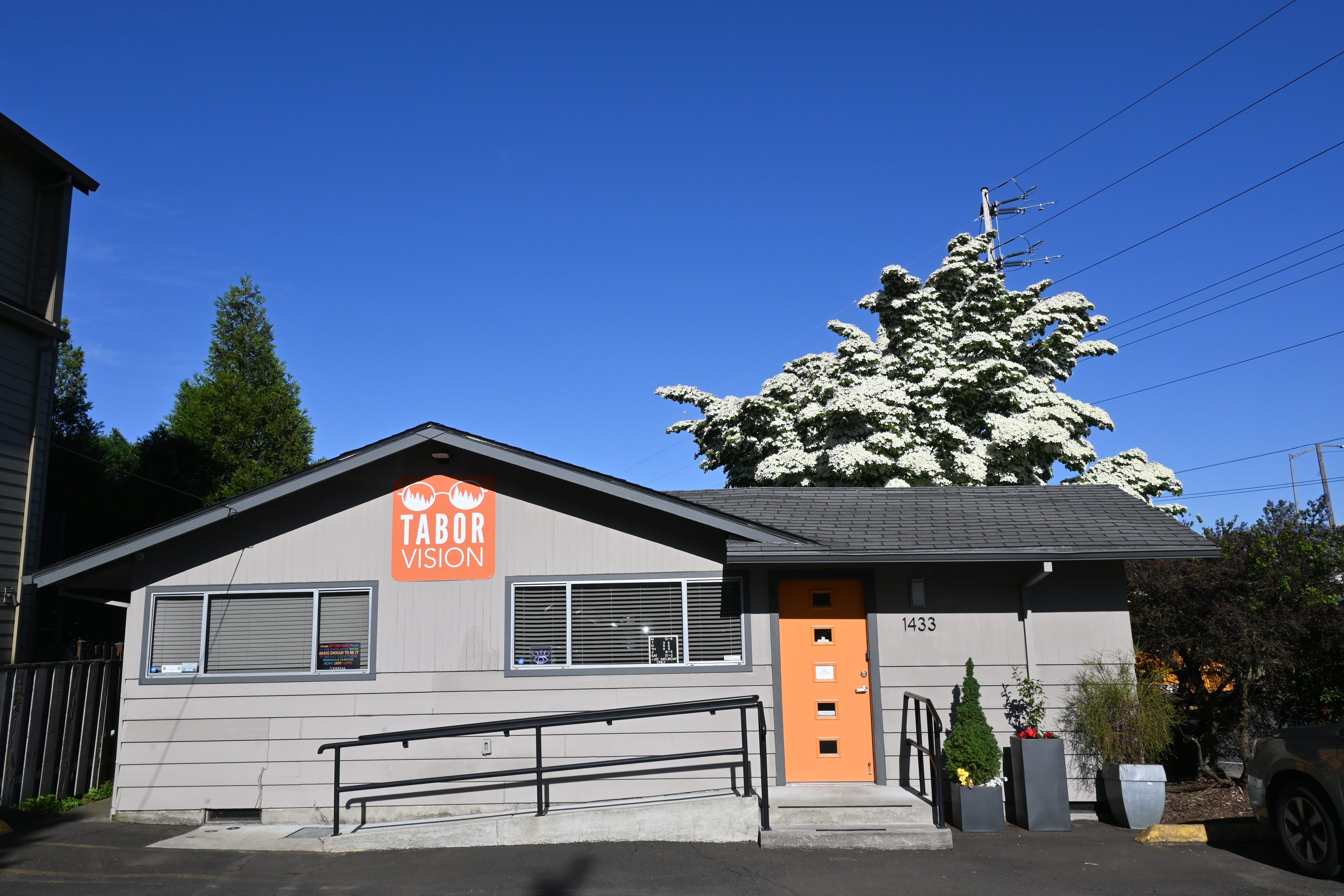 Outside view of Tabor Vision clinic on a sunny day 